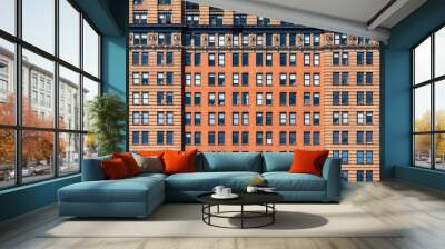 Brown Brick high building facade with windows in New York City, United states of America, USA, Industrial Background and texture, Loft inspiration. Construction facade, history and culture concept Wall mural