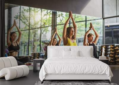 Group of diversity practicing yoga class, healthy or Meditation Exercise,stretching in upward facing dog exercise, wearing sportswear bra and pants, sports and healthcare concept, Wall mural