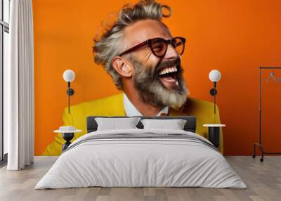 Happy middle aged man in yellow suit Wear glasses and extravagant style. Laugh and smile happily. Wall mural