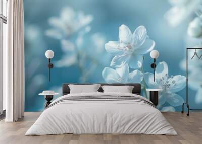 A close up of a bunch of white flowers with blue sky in the background Wall mural