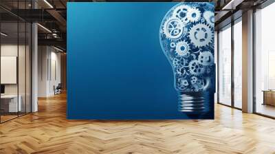 An abstract of a lightbulb made up of interconnected gears and cogs representing the concept of innovation teamwork and in a business or corporate setting Wall mural