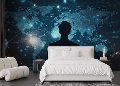 Creative depiction of a businessman showcasing a map of global connections and social media symbols, against a dramatic dark backdrop for a technology concept Wall mural