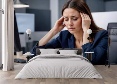 Workday Woe: Woman Struggles with Migraine Wall mural