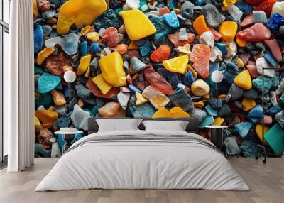 A colorful collection of smooth, polished stones arranged in a vibrant and artistic manner, perfect for nature and texture projects. Wall mural