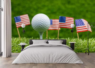 Golf ball with flag of America on green grass Wall mural