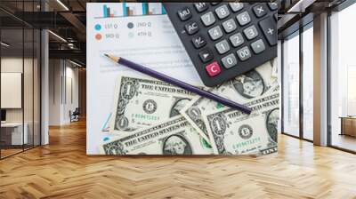 Calculator with american dollars on the wooden table background, finance concept Wall mural