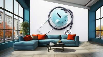 Piggy bank with stethoscope, top view Wall mural