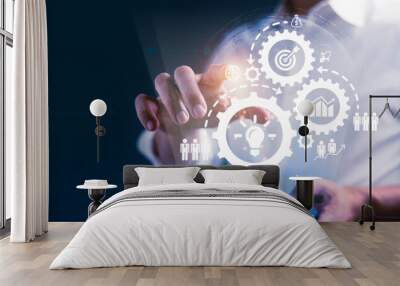 Businessman is connecting online network on virtual business icons for planning marketing target Wall mural