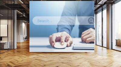 Businessman using computer to search data on workplace. Panoramic banner of networking technology and social media Wall mural