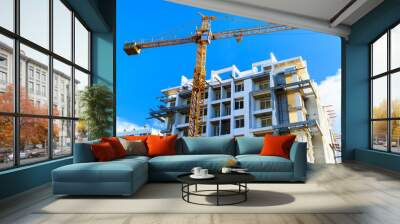 apartments construction site with yellow crane Wall mural