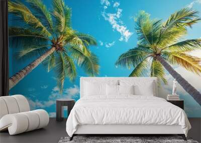 an image of two nice palm trees with blue sky beautiful tropical background Wall mural