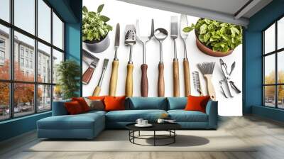 Assorted gardening tools on a white background, showcasing essential equipment for plant care  Wall mural