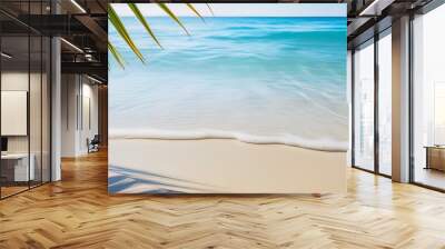 palm leaf shadow on abstract white sand beach background with sunlight in transparent water wave from above, beautiful summer vacation concept with copy space Wall mural