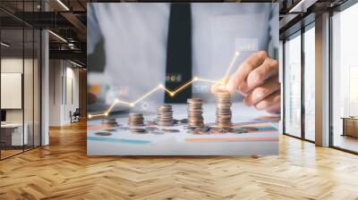 business man putting coins business growth and investment chart, strategic planning to increase prof Wall mural