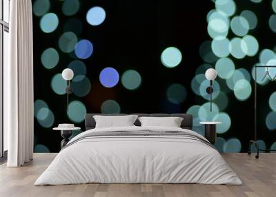 The blur of the lights is a beautiful bokeh at night. Wall mural