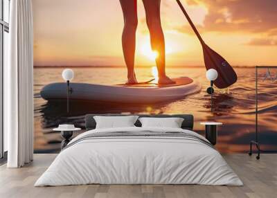 Summer sport adventure with young woman surfing in sea travel water paddle lifestyle nature person on surfboard ocean vacation sunset recreation fit and sunny sunlight holiday sunrise outdoor beach Wall mural