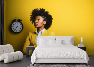 African american woman with braided hair standing over yellow background in hurry pointing to watch time, impatience, upset and angry for deadline delay Wall mural