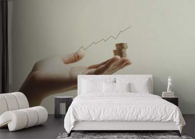 A hand holding a pile of coins, alongside an upward-trending line graph representing financial growth. Wall mural