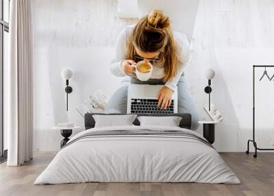 top view of woman working on responsive website scandinavian blog Wall mural