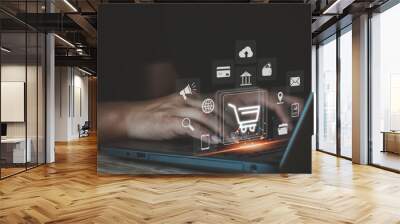 Business people use computer laptop for ordering online shopping on a shopping cart virtual screens. And online payment option or digital wallet online transaction and e-commerce technology concept. Wall mural