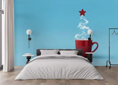 Christmas tree made of steaming coffee with red star. Morning drink. Christmas or New Year celebration concept. Copy space. Wall mural