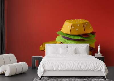 Paper cheeseburger with beef, cheese, tomato, lettuce, onion, bacon and fries on red background. Copy space. Creative or art food concept Wall mural