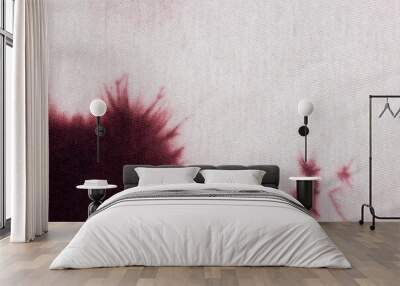 White fabric with red paint stain. Background Wall mural