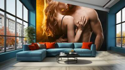 brutal sexy bearded man enjoying date with his woman. close up photo. isolated black background. Wall mural