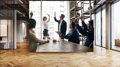 positive business people congratulating each other with good deal, happiness, positive emotion and feeling, we've done it. panorama window in the background of the photo Wall mural