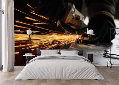 Metal grinding on steel pipe with flash of sparks close up Wall mural