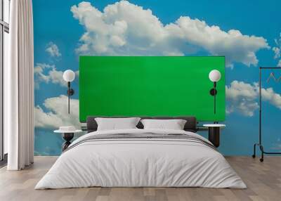 Empty billboard with chroma key green screen on blue sky with clouds advertisement concept screen green background panoramic view : Generative AI Wall mural