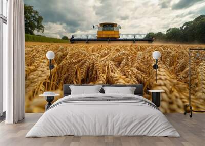 From below combine harvester with metal reel collecting dried wheat in agricultural plantation against cloudy sky in rural area with green trees : Generative AI Wall mural