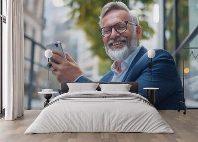 Happy middle aged business man executive using mobile phone sitting outside office Stylish older busy businessman investor wearing glasses holding smartphone looking away at copy space : Generative AI Wall mural