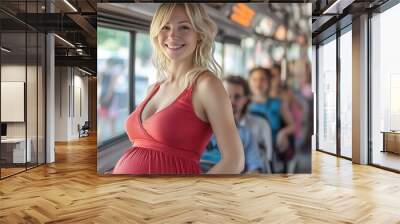 Pregnant blonde woman in a red dress happy as someone has given up their seat for her as she stands on a crowded public bus holding onto a handrail : Generative AI Wall mural