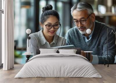 Two happy professional business people team Asian woman and Latin man workers working using digital tablet discussing financial marketing strategy at corporate office meeting vertical : Generative AI Wall mural