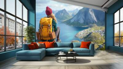 Woman traveler hiking in Norway girl backpacker relaxing on mountain cliff edge in Lofoten islands female tourist traveling outdoor alone healthy lifestyle summer vacations adventure t : Generative AI Wall mural