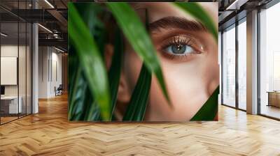 Young beautiful woman with healthy skin of face and palm leaves Closeup fresh face of an attractive caucasian girl with green plants Model with bright brown eye makeup Skin care concep : Generative AI Wall mural