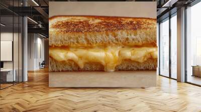 Grilled cheese sandwich with melted cheese, plain beige background Wall mural