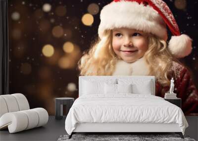 Beautiful Little happy girl with Christmas Santa's hat, concept of Christmas and new year, with snow and bokeh background, Xmas Wall mural