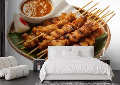 Indonesian chicken satay with delicious peanut sauce on the plate Wall mural