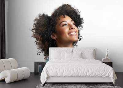 Portrait of happy African American woman smiling and looking up with afro hair, isolated on transparent background Wall mural