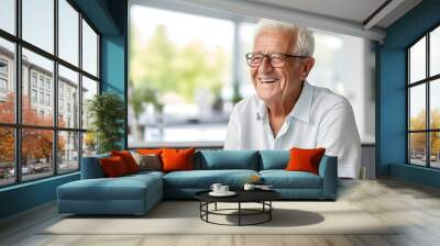 Portrait of happy senior man smiling at home Wall mural