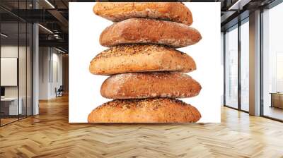 fresh baked pile of bread isolated on white. Wall mural