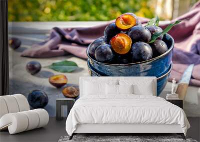 blue dish with mature fresh plums Wall mural