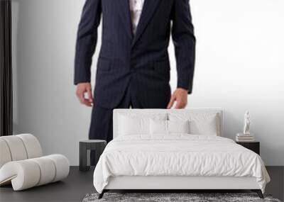 A man in a suit and tie posing for a picture, full figure shot, isolated on white in studio Wall mural