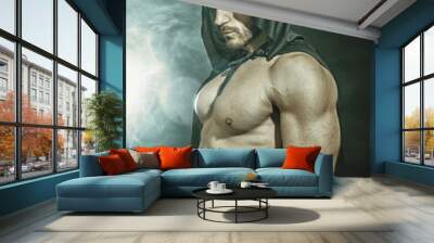 Scary muscular young man with hood and cape on naked body Wall mural