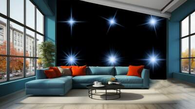 Set of sparkling blue stars on black background. Glow effect. Christmas concept. Festive lights. Vector EPS 10 Wall mural