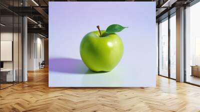 A green apple with a leaf, on a white background Wall mural