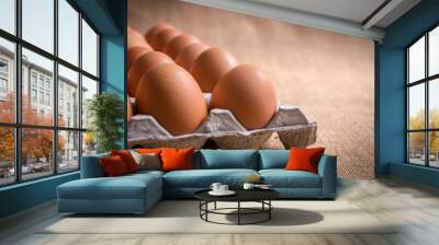 Fresh organic panel eggs on sackcloth  (gunny) with copy space for text Wall mural