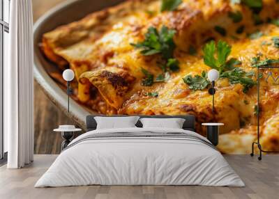 Close-up of enchiladas showing the texture of the tortillas and sauce, served on a plain dish Wall mural